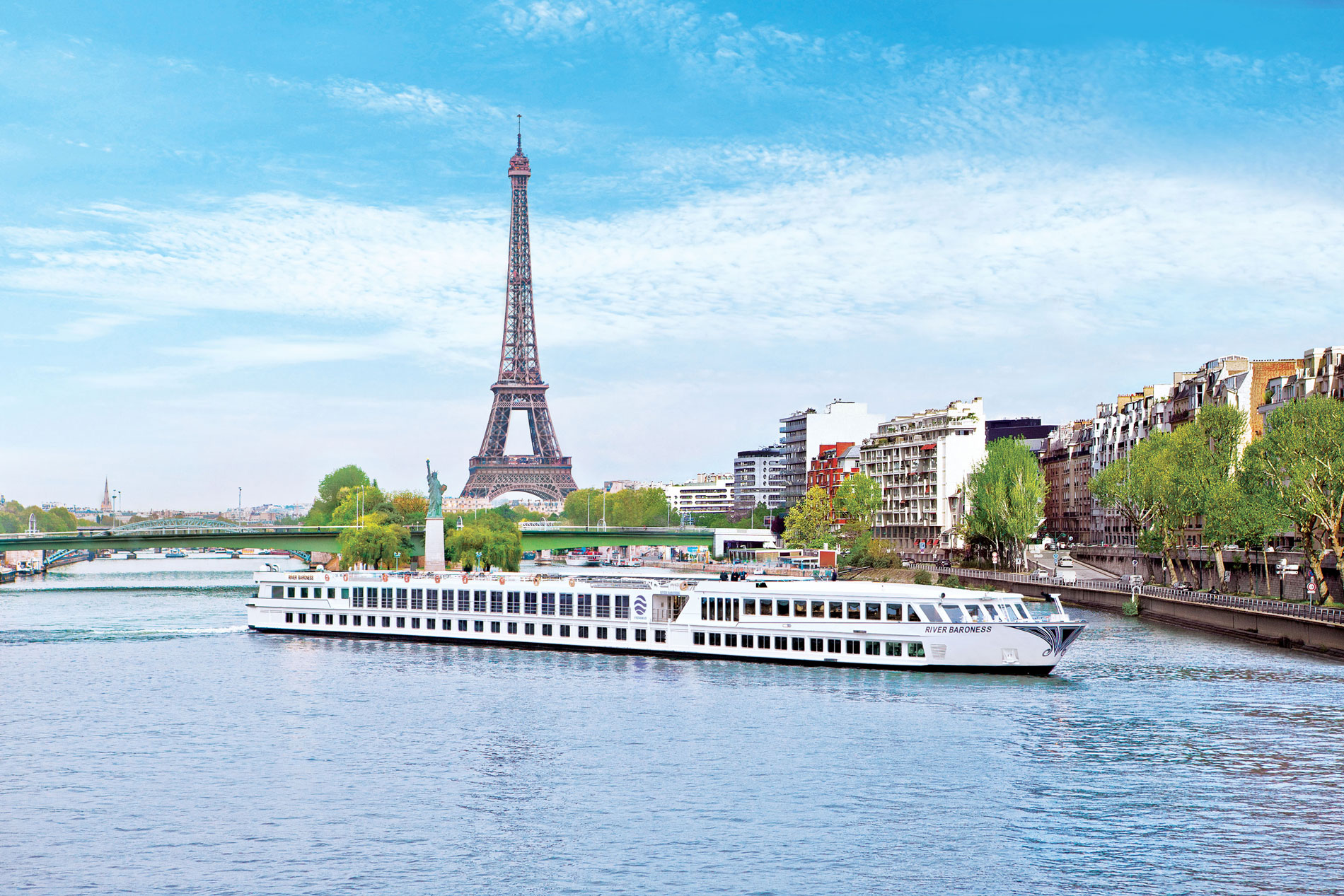 River cruise ship sailing through a European destination